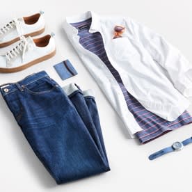 An outfit including jeans, sneakers and shirts.
